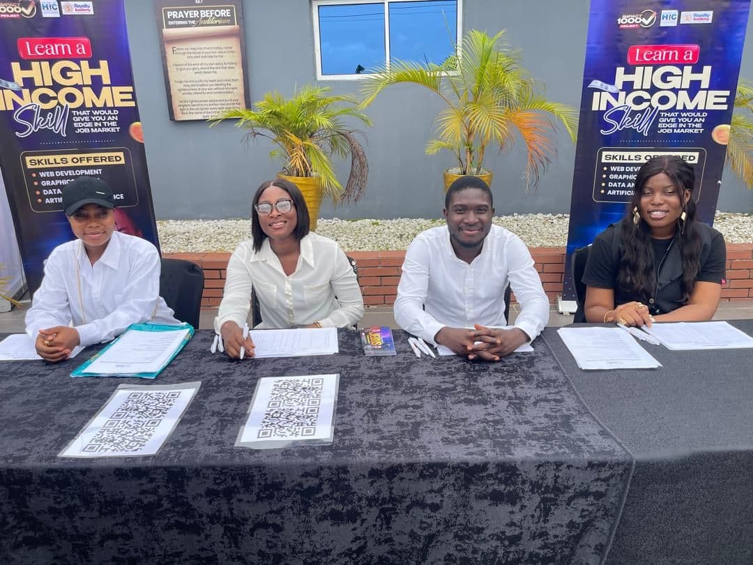 Royalty Academy team at the Learn a High Income Skill registration table