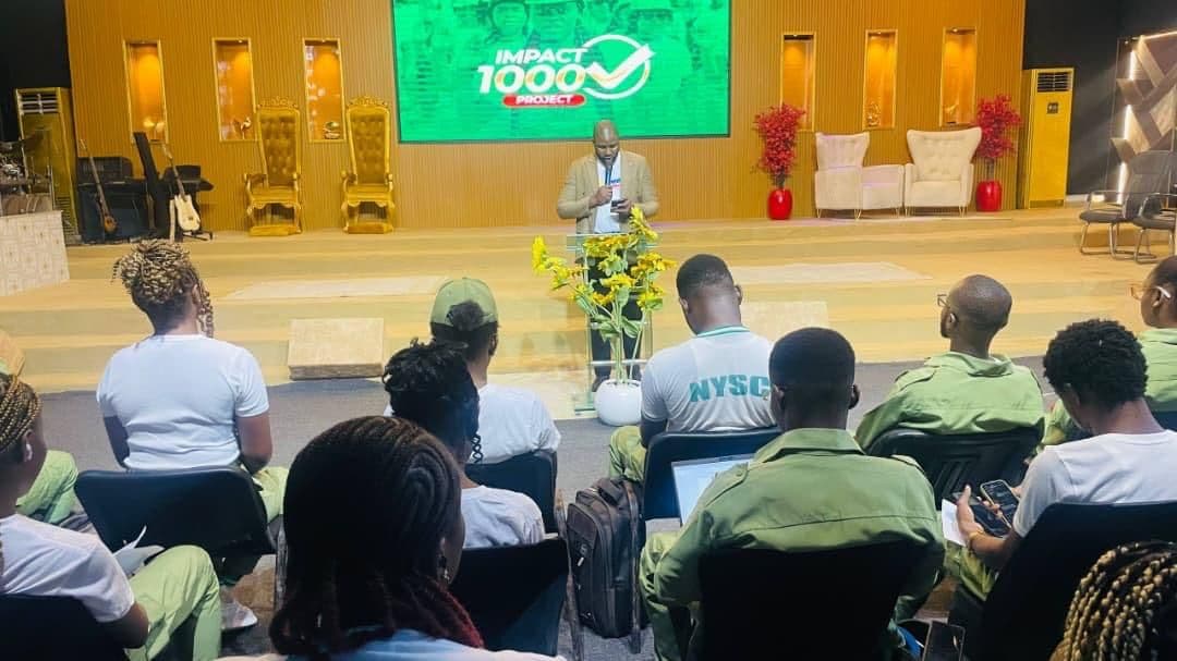 Royalty Academy facilitator speaking at the IMPACT 1000 training session