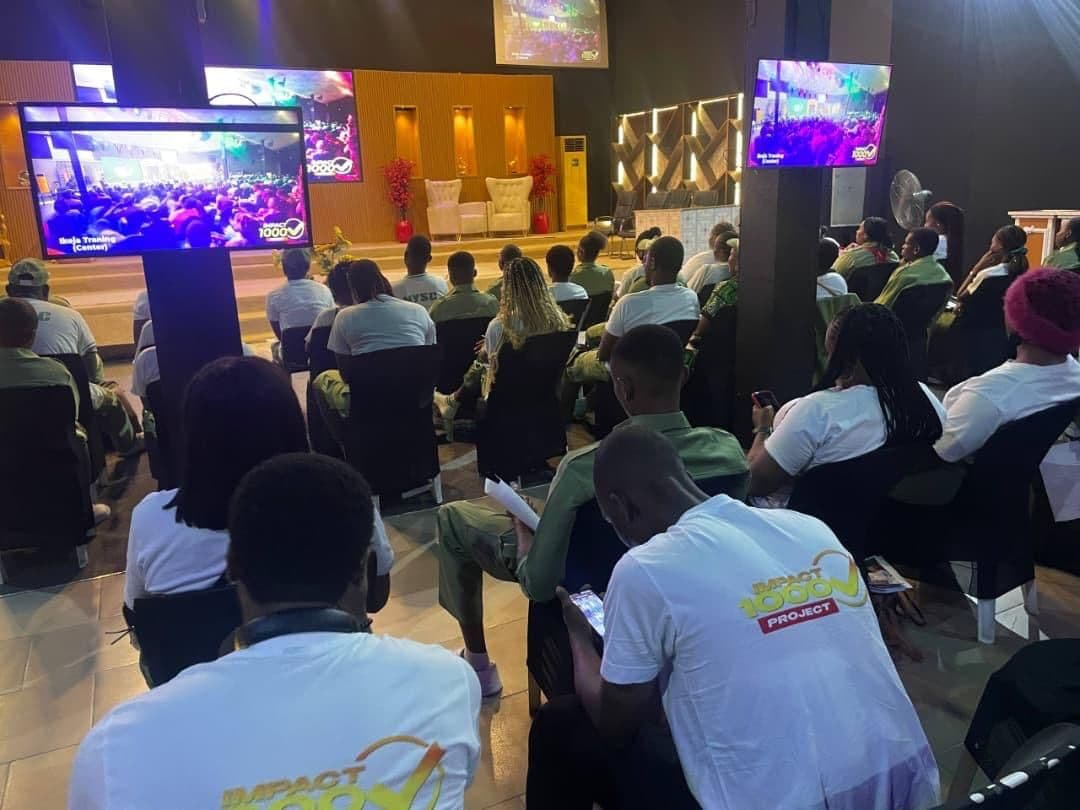 Corps members watching the IMPACT 1000 training session on screen